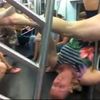 Video: Subway Pole Dancer Shows Buskers How It's Done
